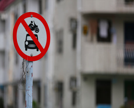 A no parking sign at a certain location means?