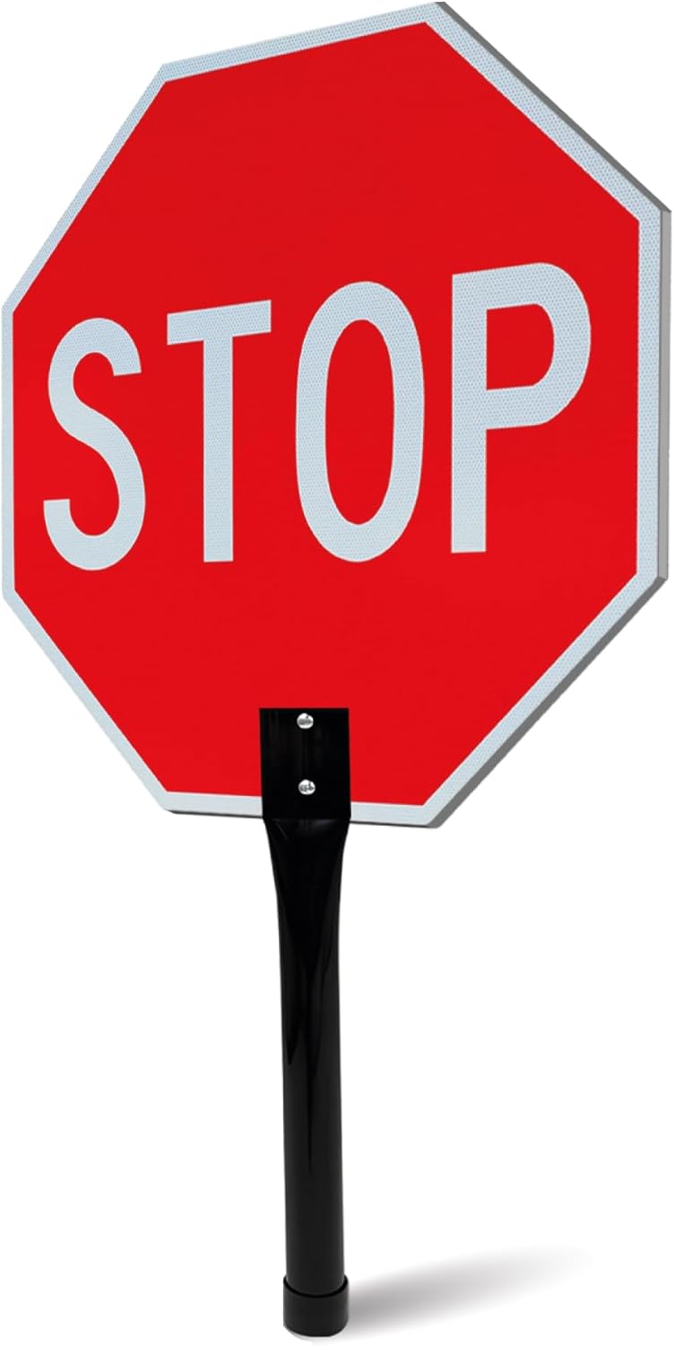 Red stop sign with a black stand on a white background